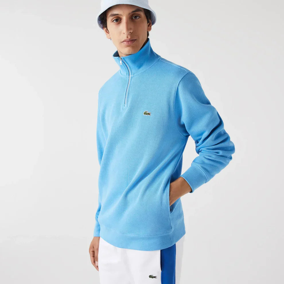 Sweater Lacoste 1/4 Azul Celeste